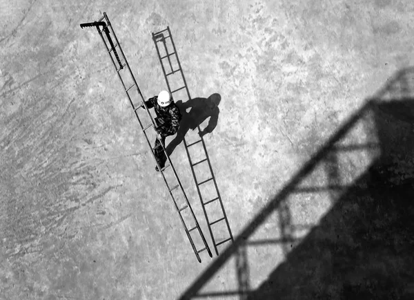 man climbing stairs in the park