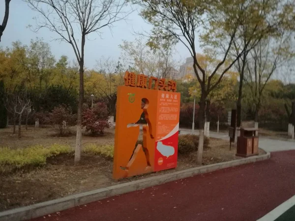 a red traffic sign on the road