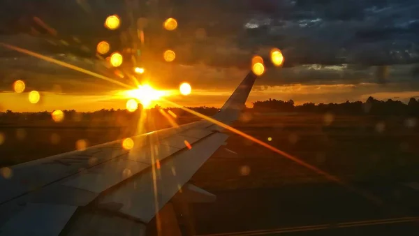 airplane at sunset at night