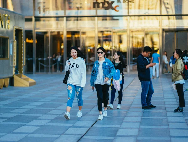 street photo of people in street, Vientiane City, Qingdao