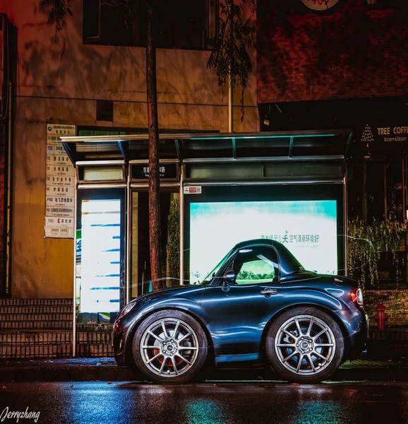 car on the street with cars