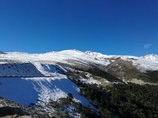 mountain landscape with snow and blue sky