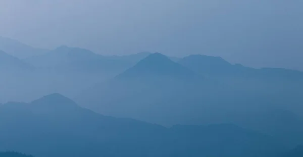 mountain landscape with mountains and mist