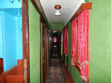 Interior room of a railway car in a train