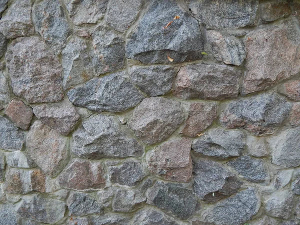 Die Textur Des Natursteins Und Die Konstruktion Der Mauer — Stockfoto