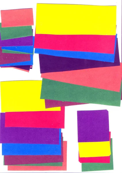 Pappers applicering skuren från färgad med sax — Stockfoto