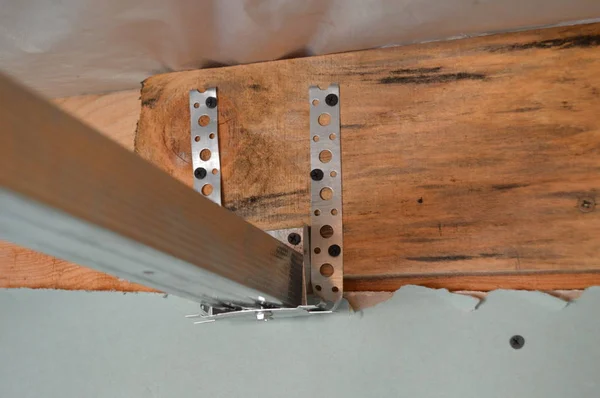 Installation of a metal profile for drywall — Stock Photo, Image