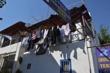 GUMBET, TURKISH - HAZİRAN 02, 2020: Bodrum şehrinin genel görünümü, sokaklardaki insanlar