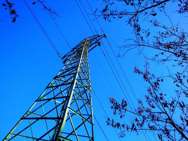Sziluett Nagyfeszültségű Elektromos Torony Naplementekor Naplementekor Háttér — Stock Fotó