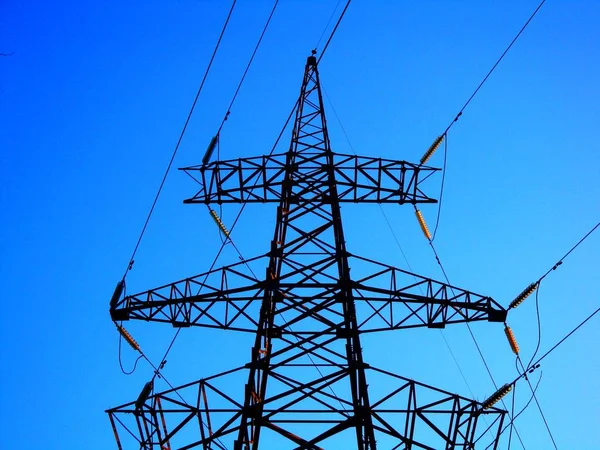 Sziluett Nagyfeszültségű Elektromos Torony Naplementekor Naplementekor Háttér — Stock Fotó