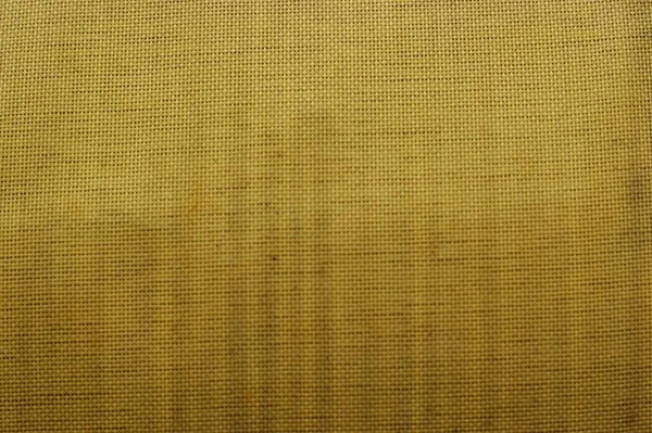 Abstrakt gelb Kunststoff Maische Textur Hintergrund schwarz — Stockfoto