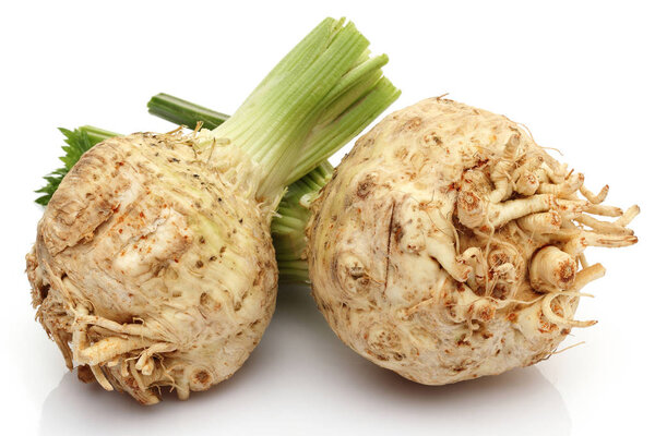 Fresh celeriac isolated on white background