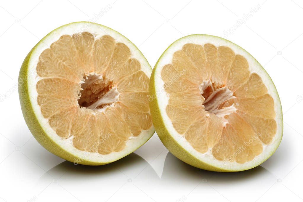 Pomelo fruit halved isolated on white background