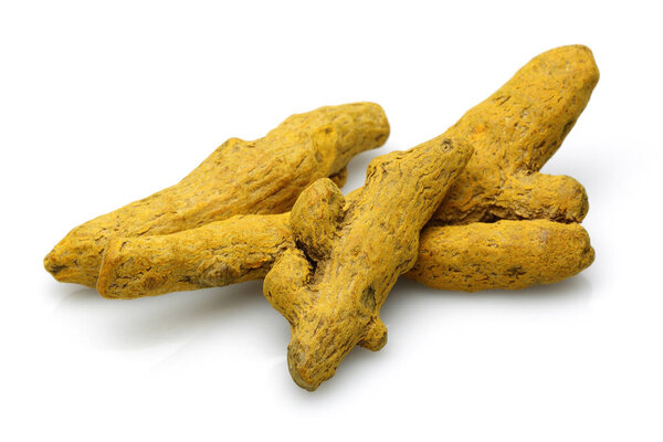 Dried turmeric isolated on white background