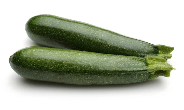Due Zucchine Verdi Intere Isolate Fondo Bianco — Foto Stock