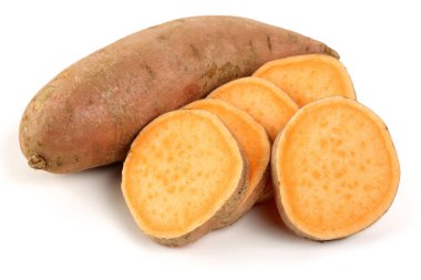 Raw sweet potato with slice isolated on white clipart