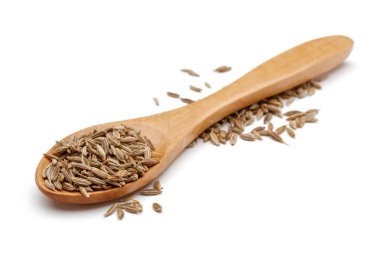 Tahta kaşık beyaz izole Kimyon tohumu