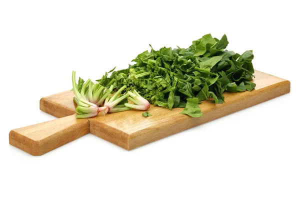 Chopped spinach on wooden board isolated — Stock Photo, Image