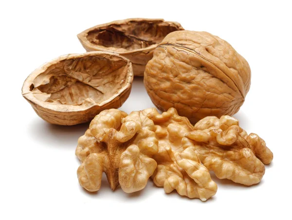 Whole and broken walnuts isolated on white — Stock Photo, Image
