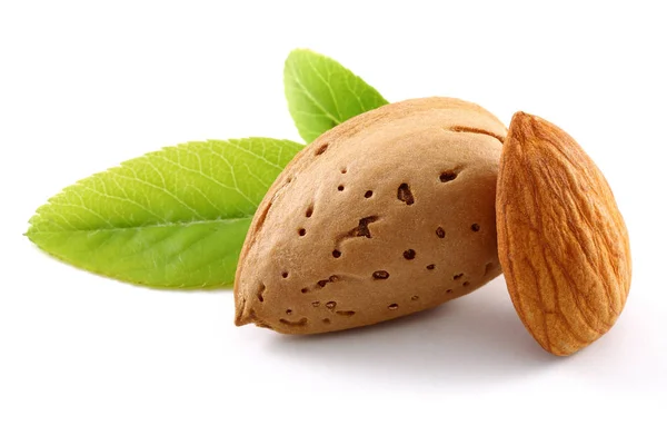 Group of almonds with leaves isolated on white — Stock Photo, Image