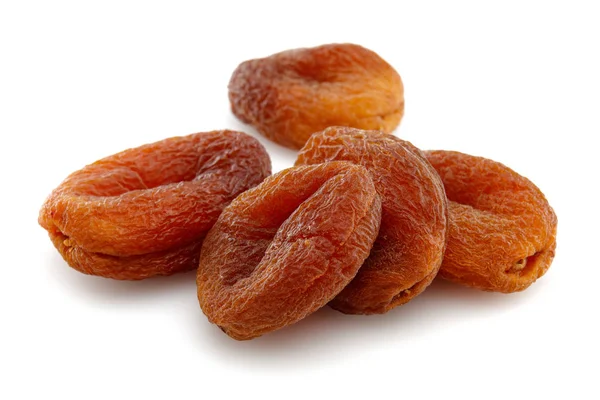 Organic dried apricots isolated on white background — Stock Photo, Image