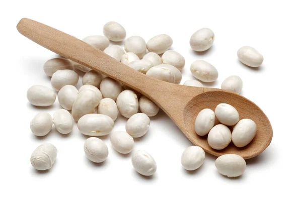 White haricot beans and wooden spoon isolated — Stock Photo, Image