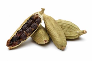 Cardamom pods and seeds isolated on white clipart