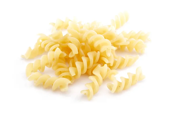 Heap of Fusilli pasta isolated on white — Stock Photo, Image