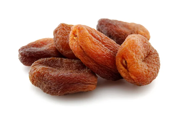 Organic dried apricots isolated on white — Stock Photo, Image