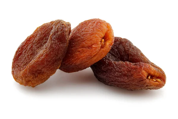 Organic dried apricots isolated on white — Stock Photo, Image