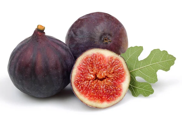 Fruta de figo roxo fresco e fatia com folha isolada — Fotografia de Stock