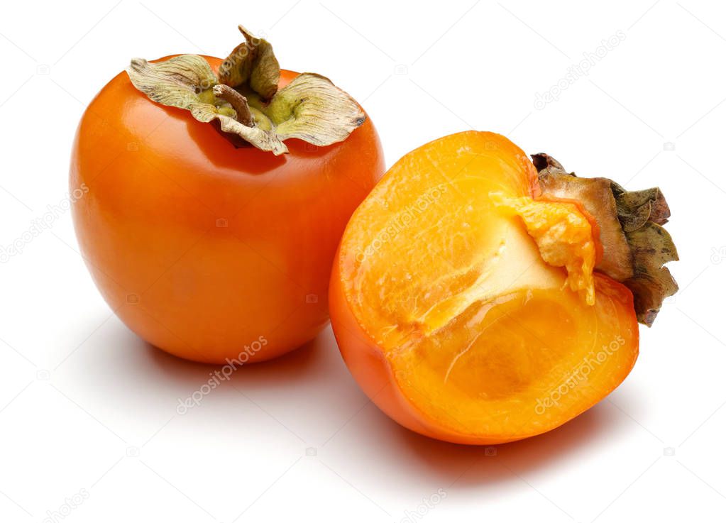 Whole and sliced ripe persimmon fruits isolated