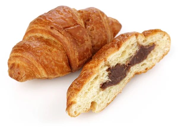 Croissant affettato con cioccolato isolato — Foto Stock