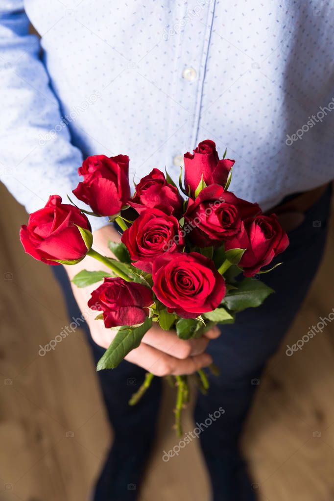 Valentines day, Womans day, 8 march romantic surprise red flowers, handsome man,love.