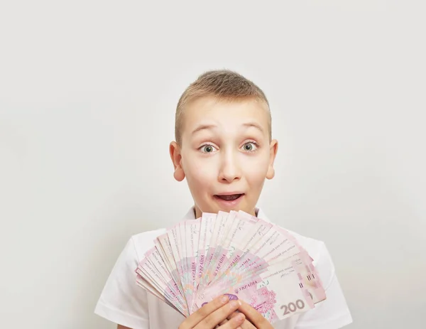 Niño Con Dinero Hryvnia Sobre Fondo Blanco —  Fotos de Stock