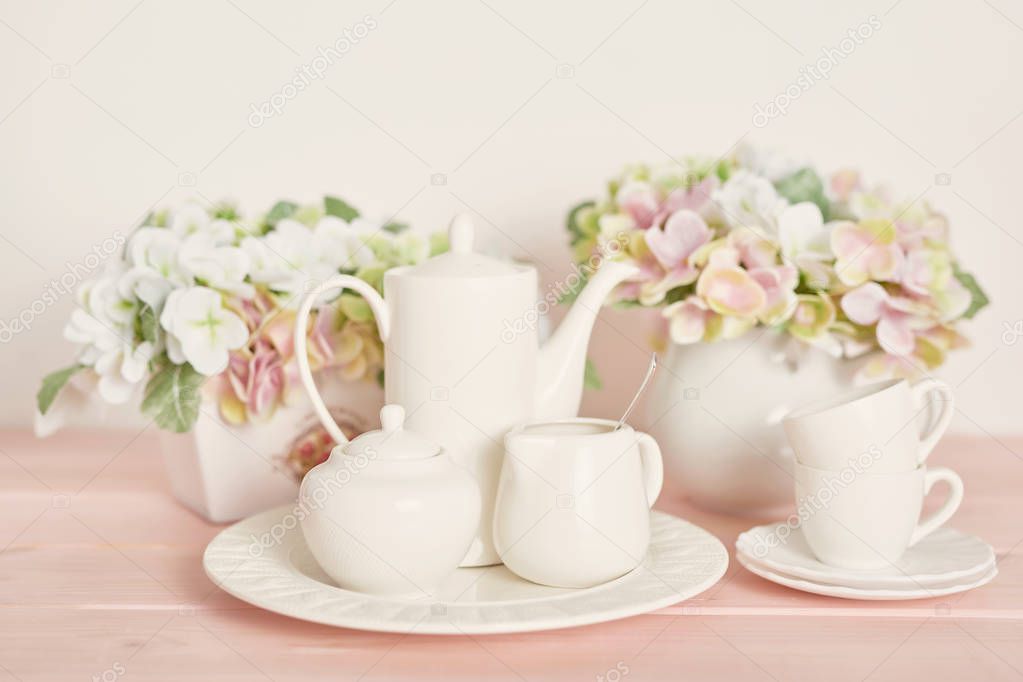tea and coffee set on the table on a white background