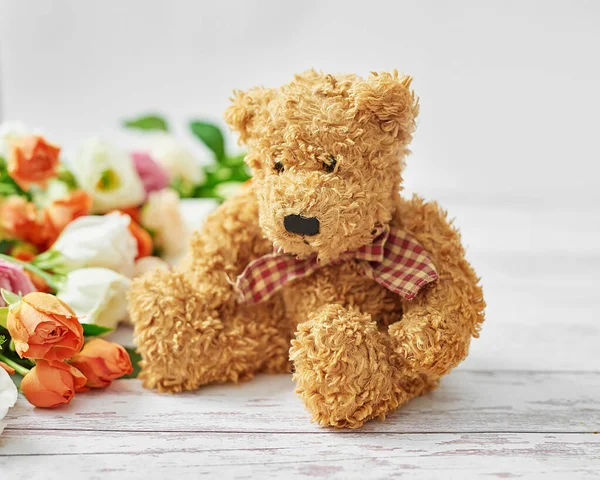 Flowers and gifts for women\'s day. Mother\'s day greeting card. Stuffed toys Bear. Bouquet of flowers in vase. Happy Birthday! Valentine\'s day gift. 14th February. Love concept.