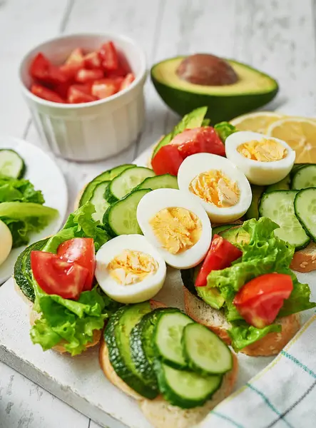 Grain Bread Sandwiches Breakfast Snacks Toasts Avocados Eggs Tomatoes Cucumbers — Stock Photo, Image