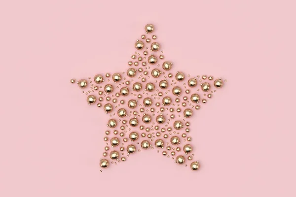 Estrella Con Adornos Navidad Dorados Sobre Fondo Rosa — Foto de Stock