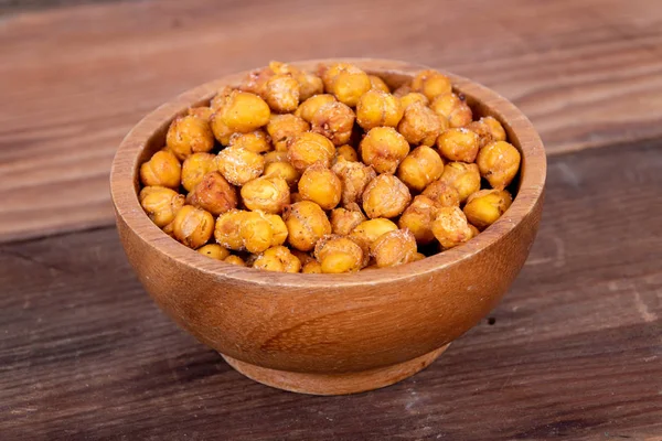 Chick Peas asado snack saludable en mesa de madera —  Fotos de Stock