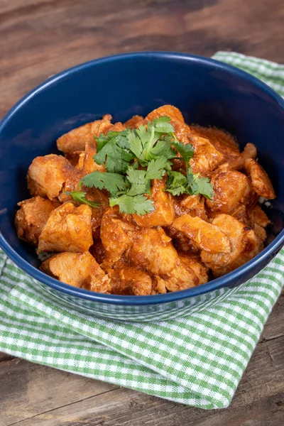 Indian butter chicken dish with cilantro on top — Stock Photo, Image