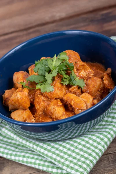 Indian butter chicken dish with cilantro on top — Stock Photo, Image
