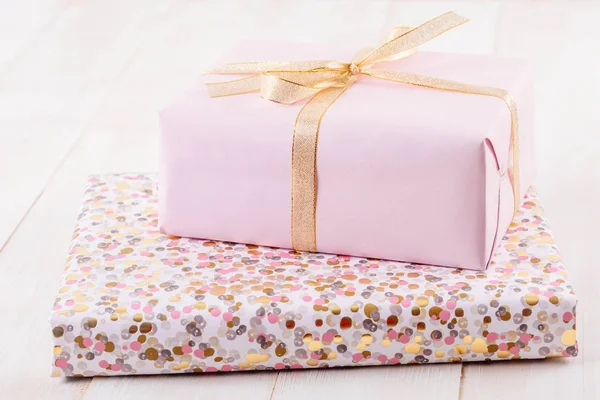 Pink Gift Box On Wood Boards