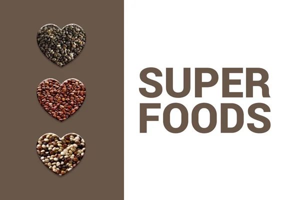 Hearts with chia seeds, red quinoa grains and blended quinoa on brown background. Four heart shapes with Text superfoods on white background. Organic Vegan food. Bio Superfoods.
