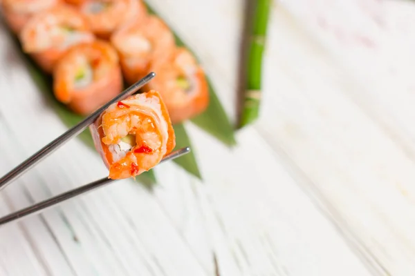 Close Sushi Roll Piece Avocado Black Tiger Shrimp Top Wrapped — Stock Photo, Image