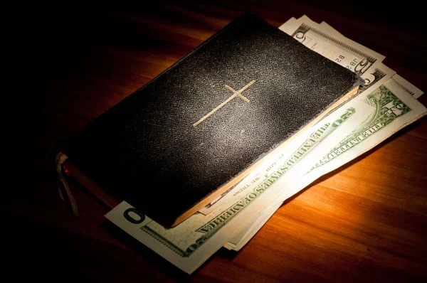 Bible Money Spot Light — Stock Photo, Image