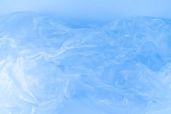青いシフォン生地背景 — ストック写真