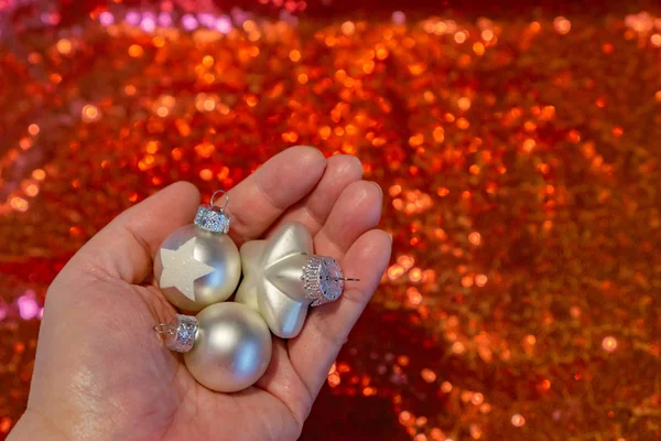 Christmas Ball Holding Hand — Stock Photo, Image