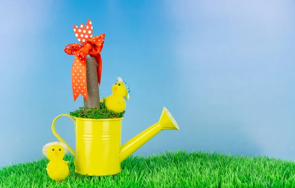 Yellow Watering Can Two Little Chicks Stick Red Bow Garden — Stock Photo, Image