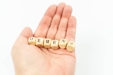 Mektup küpleri ve Almanca bunaklık anlamına gelen beyaz arkaplan.